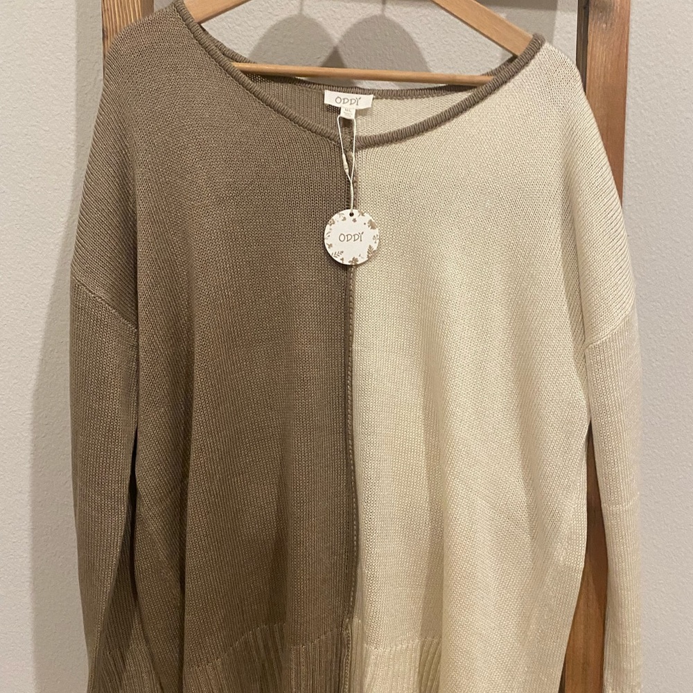 Beige and cream oddi sweater.   Brand new.  Never worn